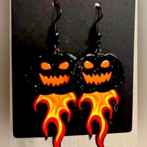 Black pumpkin with flames